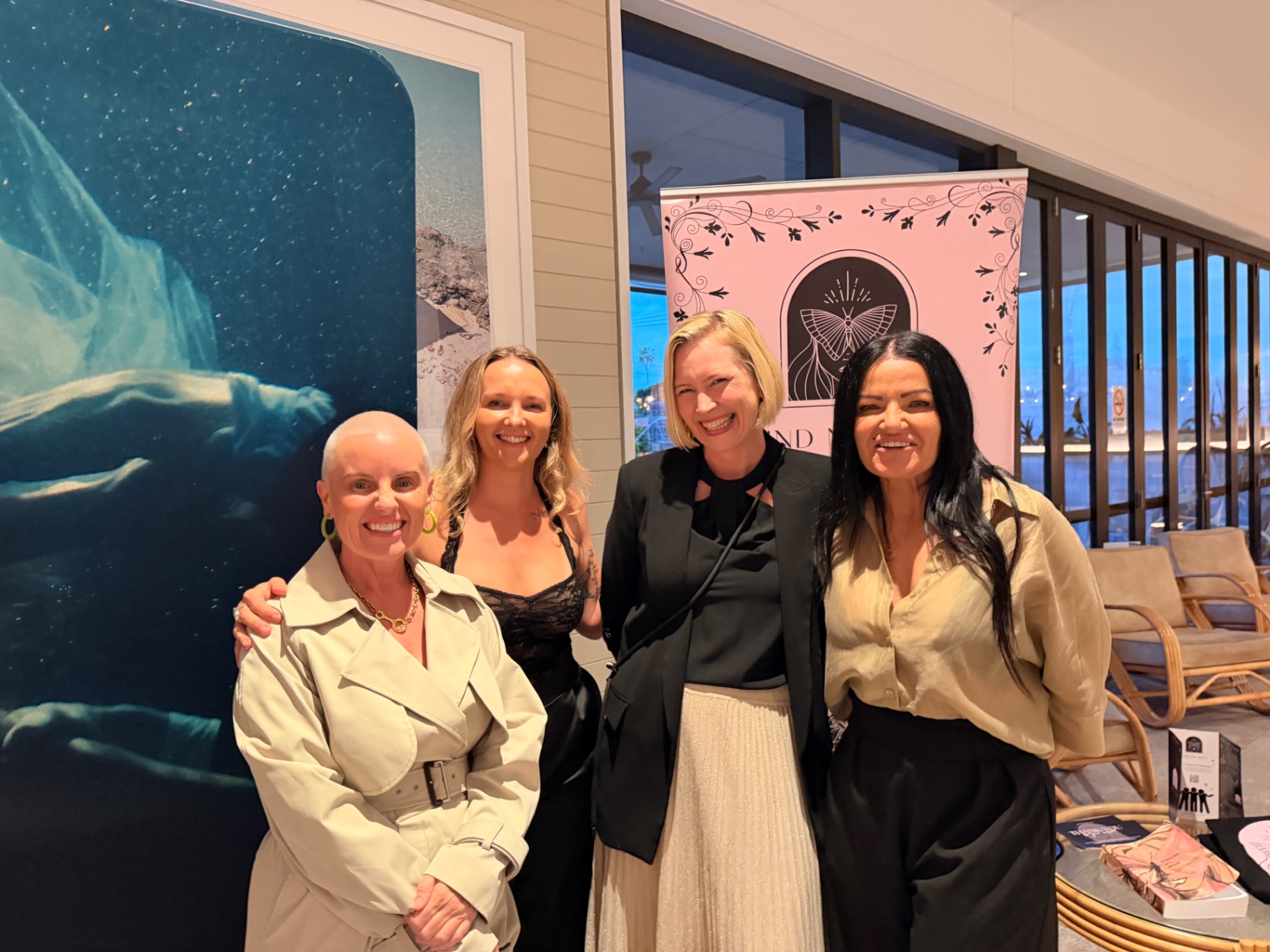 Lauren Jane with guests beside the Find My Wild banner at the premiere