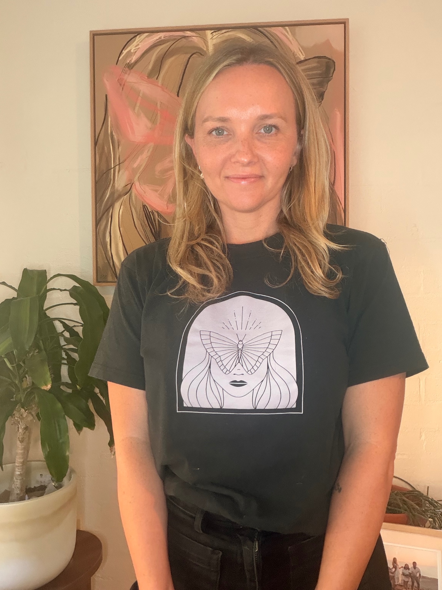 Lauren Jane, founder of Find My Wild, wearing a Finding My Wild t-shirt