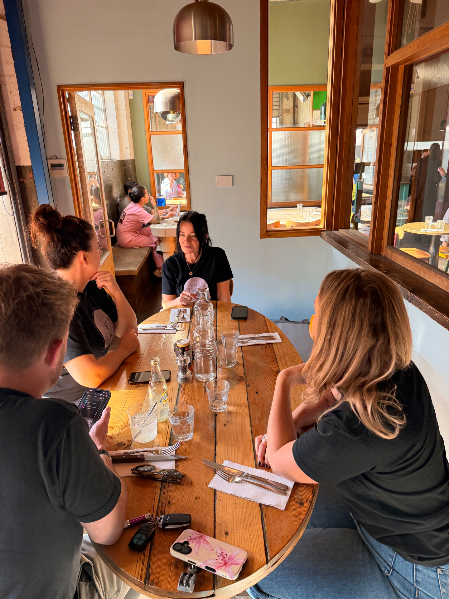 Team conversation at a local cafe