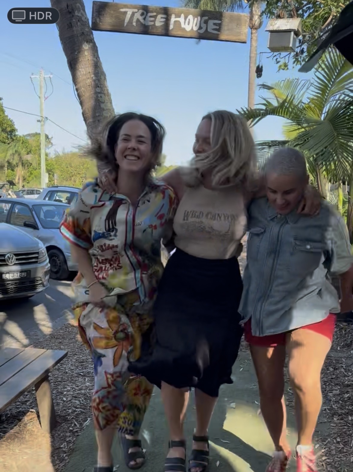 Lauren Jane laughing with friends outside the Treehouse