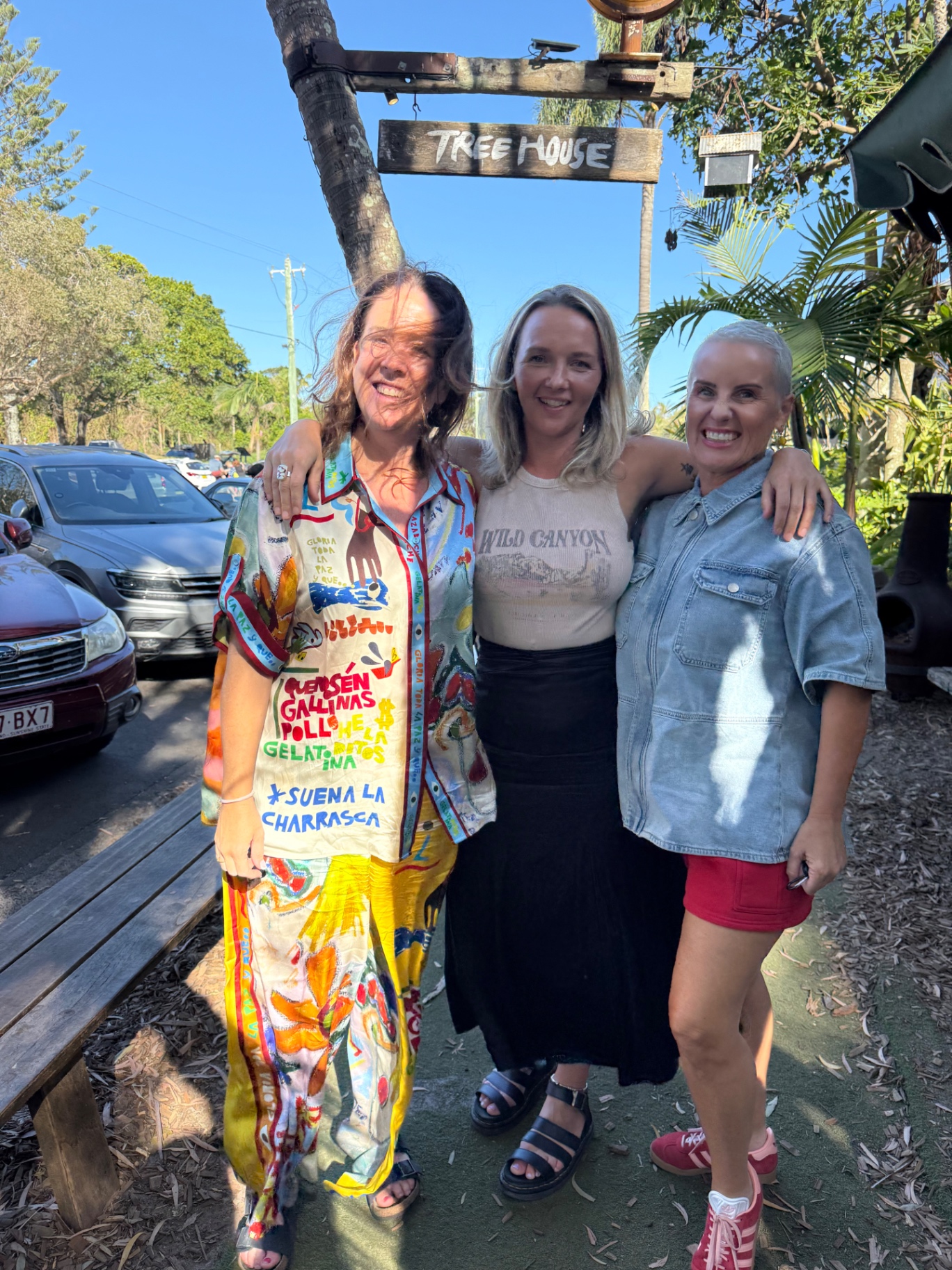 Lauren Jane with two friends outside the Treehouse in Byron Bay