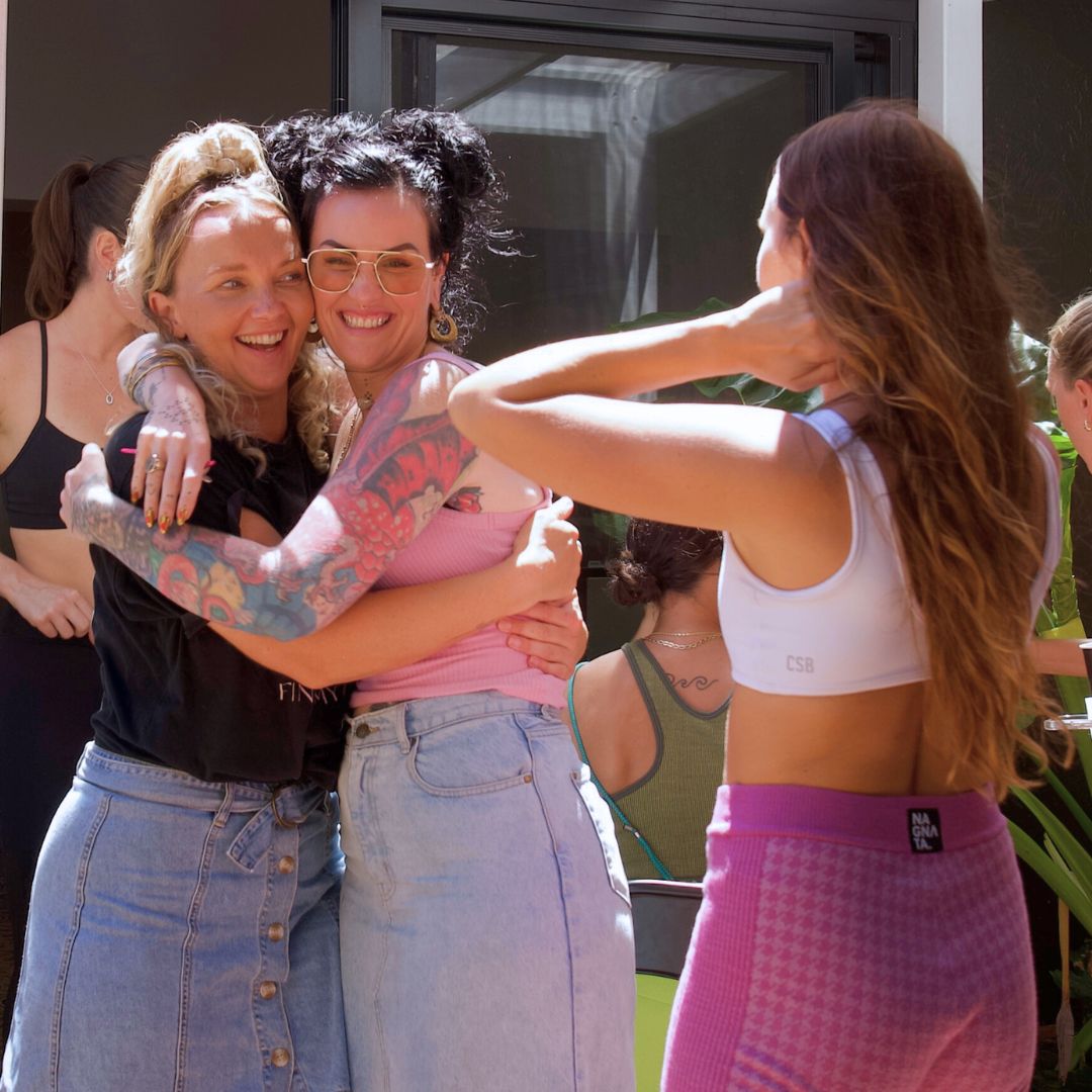 Lauren Jane hugging a member of the Find My Wild community